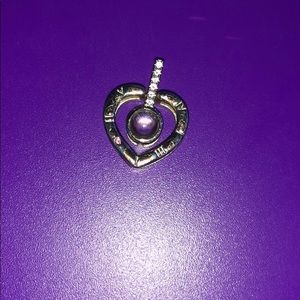 Heart charm shine a light through